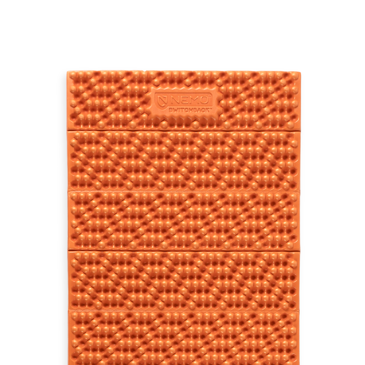 A NEMO Equipment Switchback™ Ultralight Sleeping Pad in orange, featuring a textured dimpled surface and Hypnoelastic zones, is displayed against a white background.