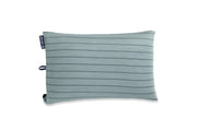The NEMO Equipment Fillo™ Backpacking & Camping Pillow is a rectangular light blue pillow with horizontal dark blue stripes, a navy tag on the side, and a small bottom left loop, shown on a white background.