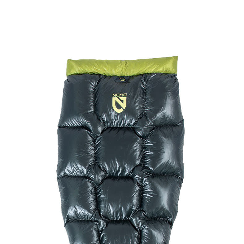 A black and green Pulse™ Endless Promise® Ultralight Backpacking Quilt from NEMO Equipment, featuring the NEMO logo on the front, displayed against a white background.