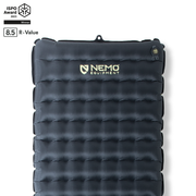 A black NEMO Equipment Tensor™ Extreme Conditions Ultralight Insulated Sleeping Pad with horizontal baffles, Thermal Mirror film for warmth, ISPO Award 2023 Winner badge, and an 8.5 high R-value label in the top left corner.