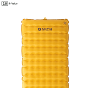 The NEMO Equipment Tensor™ Trail Ultralight Insulated Sleeping Pad is yellow, has horizontal air chambers with Spaceframe baffle design, the NEMO logo, a top right valve, and an R-value of 2.8.