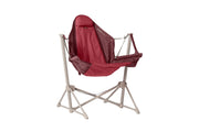 The NEMO Equipment Stargaze™ EVO-X Folding Reclining Camp Chair is a luxury portable outdoor chair with a red fabric seat and backrest, supported by a beige metal frame, perfect for camping.